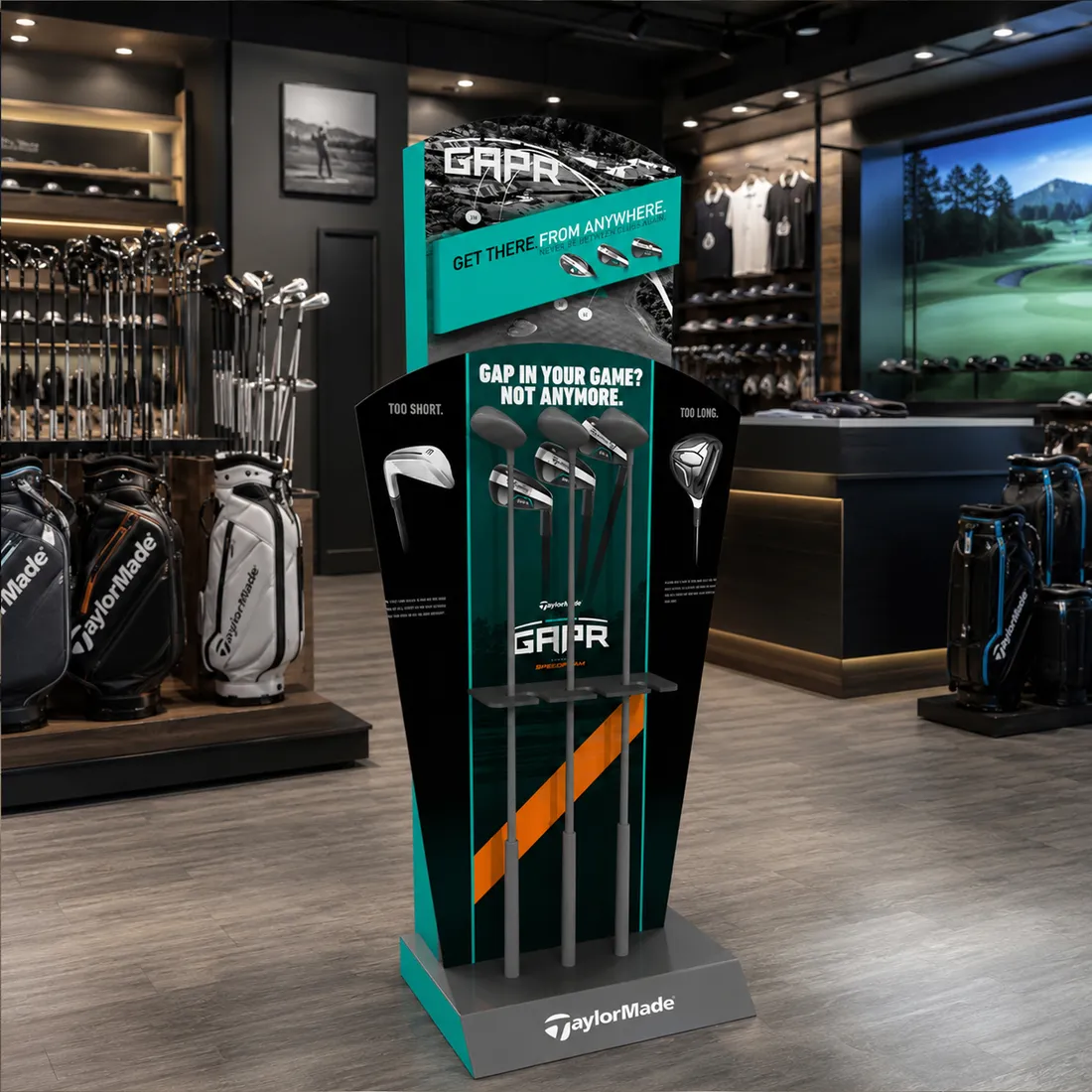 TaylorMade GAPR launch floor display with flared panels and demo clubs in a premium golf shop